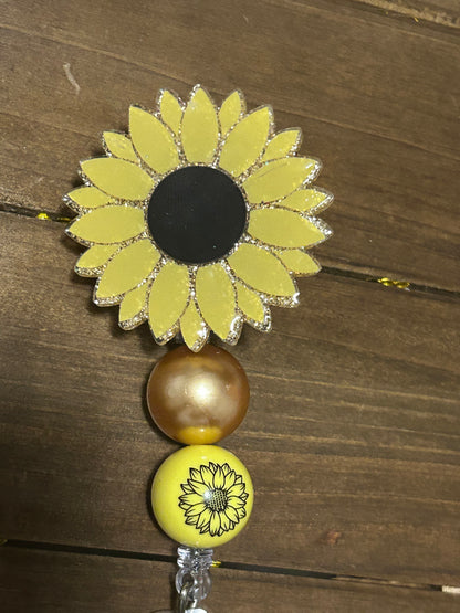 Sunflower badge reel