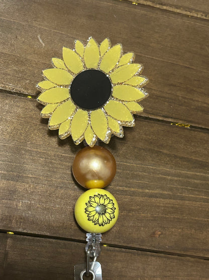 Sunflower badge reel