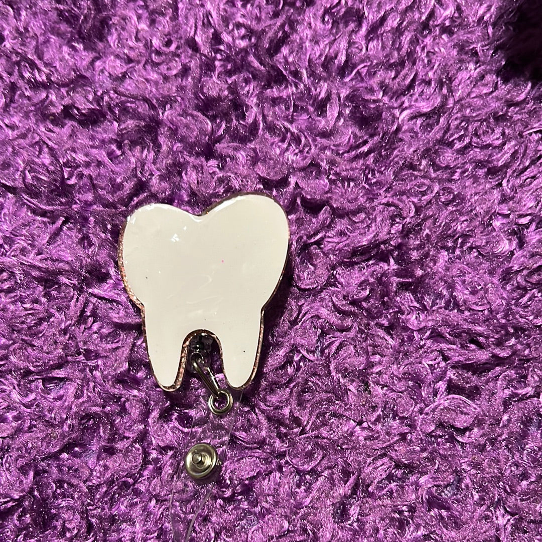 Tooth badge reel